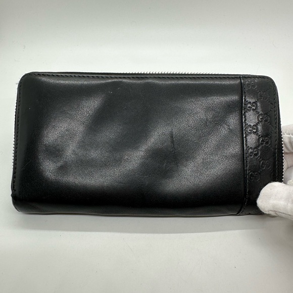 Gucci Handbags - Gucci large Guccissima Zip around wallet